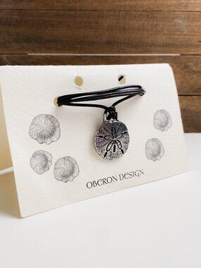 Oberon Design Handmade Leather Cord Sand Dollar Pendant Silver Tone Necklace